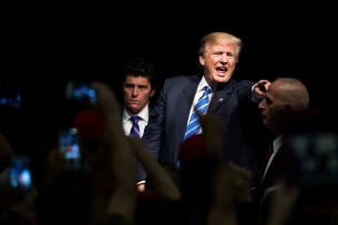 COUNCIL BLUFFS, IA - 09/28/2016 - Republican presidential candidate Donald Trump reacts to a crowd of supporters during a campaign rally on Wednesday, Sept. 28, 2016, at the Mid-America Center. KRISTIN STREFF, Journal Star